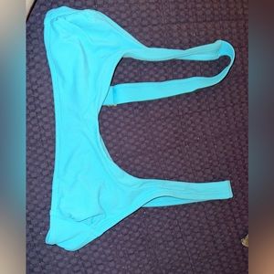 blue swimsuit top. traps are adjustable, can fit on girls w/ smaller cup size